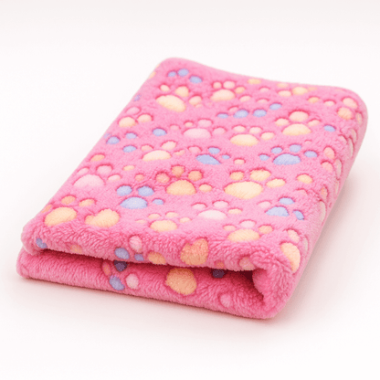 Pink blanket with heart pattern on a white background