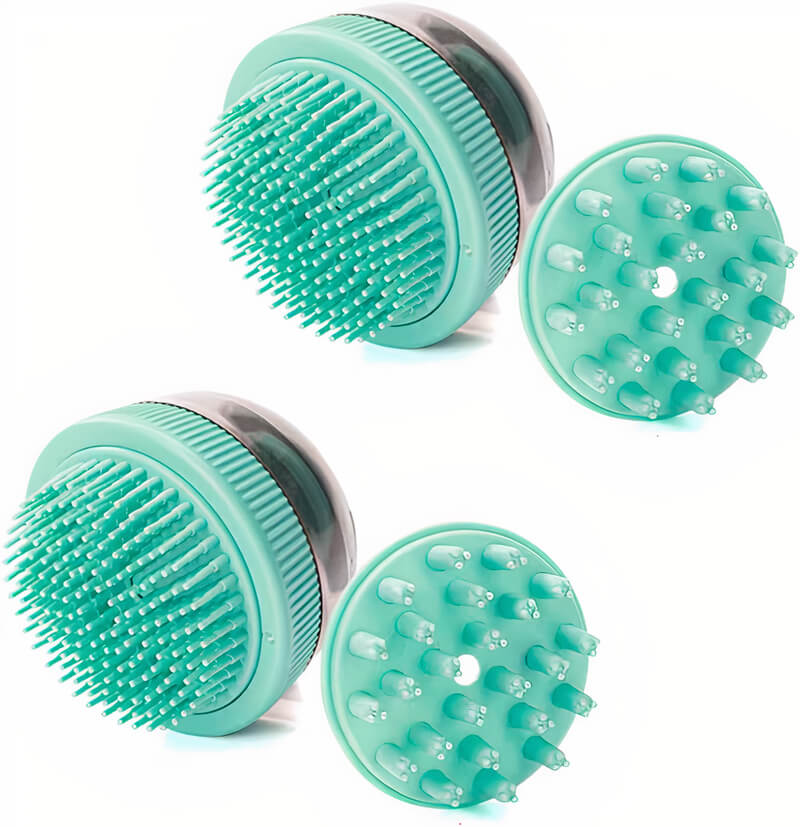 Four teal silicone scrubber heads with textured surfaces on a white background