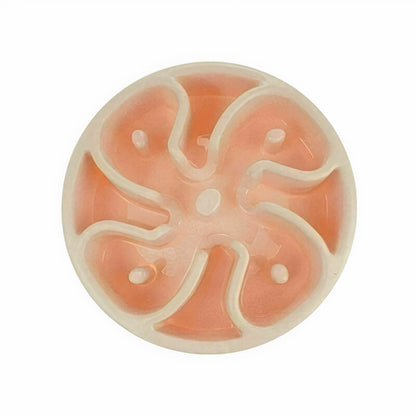 Decorative ceramic tile with a floral pattern on a white background